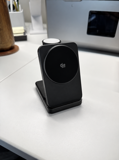 Store-supplied sample image of a matte black charging stand on a white desk