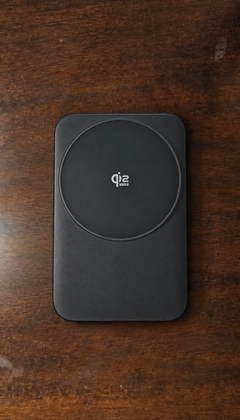 Store-supplied sample image of a folded matte black charger on wood
