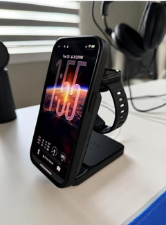 Store-supplied sample image of a black charging station holding a phone and watch
